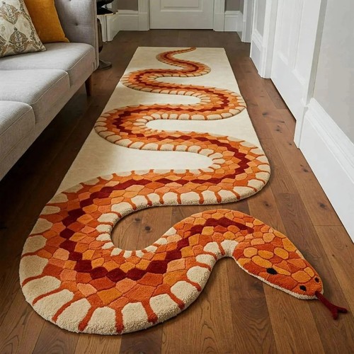 Hand tufted wool serpent - hand,